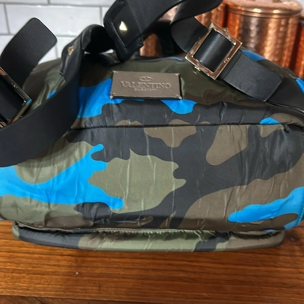 Valentino Garavani with COA nwot. Has hang tag and luggage tag. Unisex. Bookbag